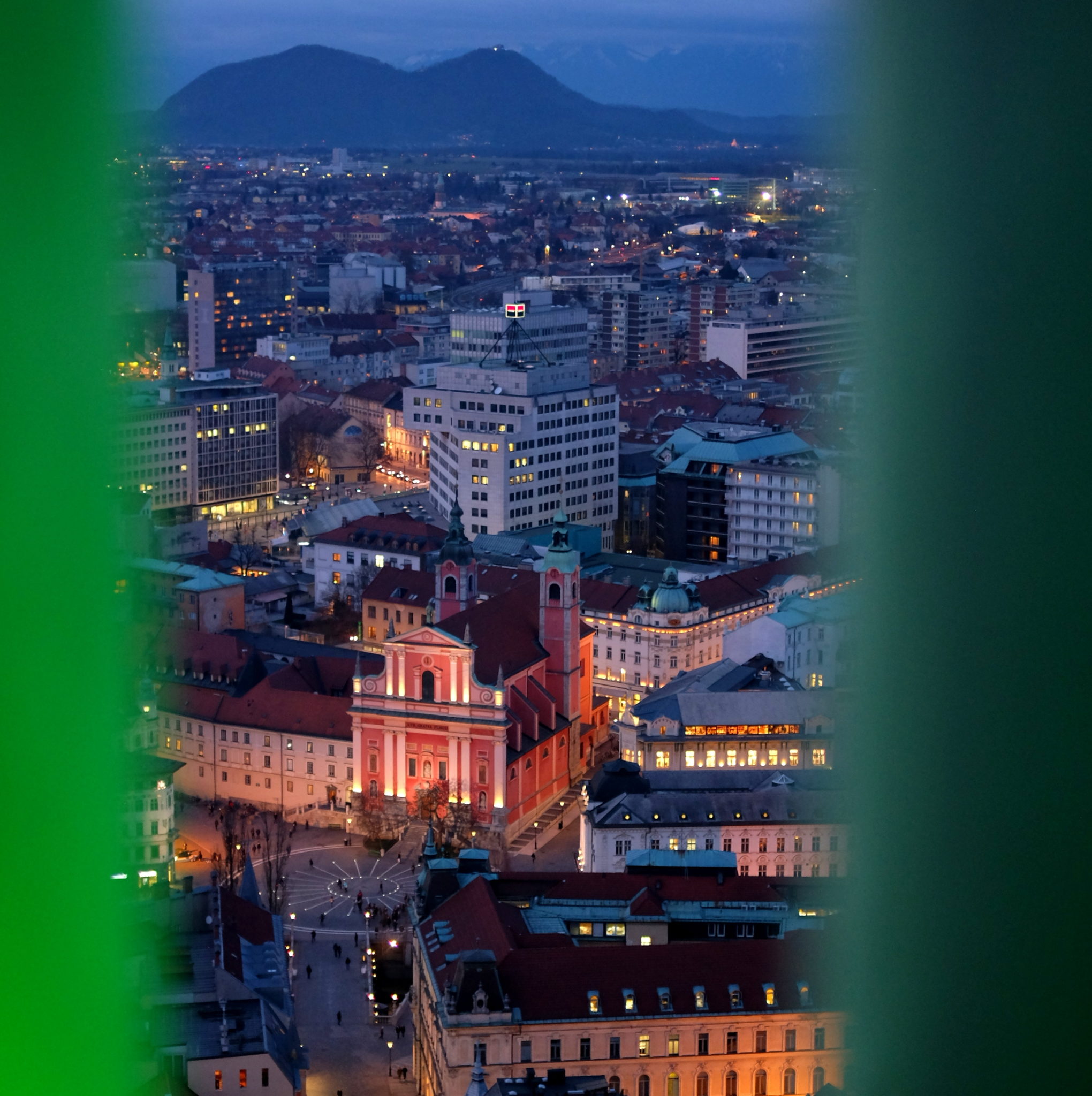 Prešeren Square, the Franciscan Church of the Annunciation and Šmarna Gora in the background, where it all began the very same morning. Photo by: Exploring Slovenia. 