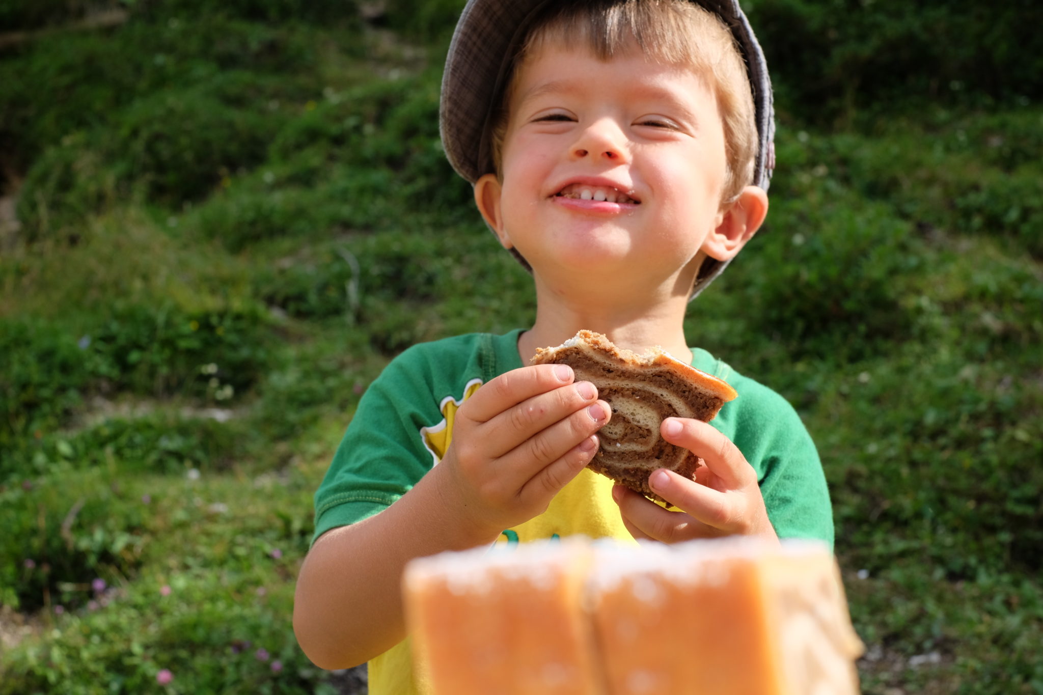 After a 3-hour hike towards Mt. Debela Peč, 6,600 Ft or 2,014 m, he was thrilled to get a piece of a traditional Slovenian pastry, potica. Photo by: Exploring Slovenia.