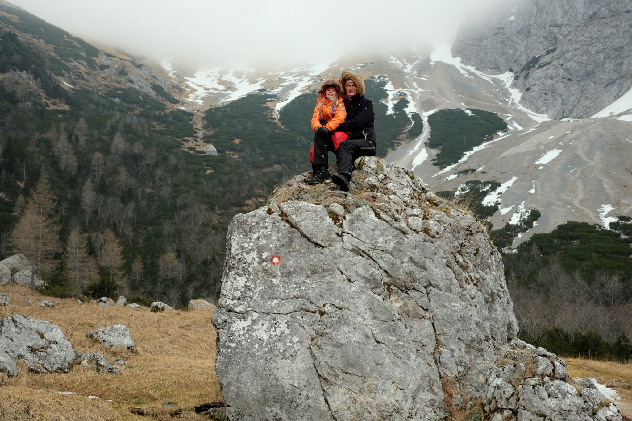 We picked a wrong day for the mountains – extremely windy with zero visibility at the top. This was supposed to be our last photo before we turned around, but then our daughter insisted on going further on until we finally reached the top of a mountain pass Kamniško Sedlo. Elevation gain: 3,165 Ft or 964 m. Photo by: Exploring Slovenia.