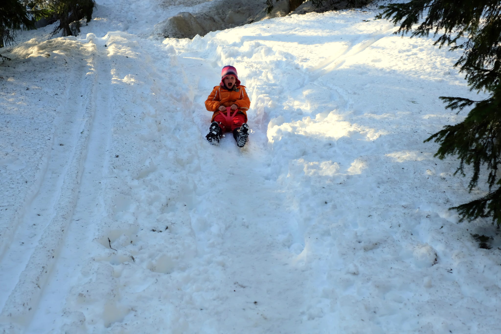 Snow sled glider is easy to carry up and can be a game changer for getting down. Photo by: Exploring Slovenia.