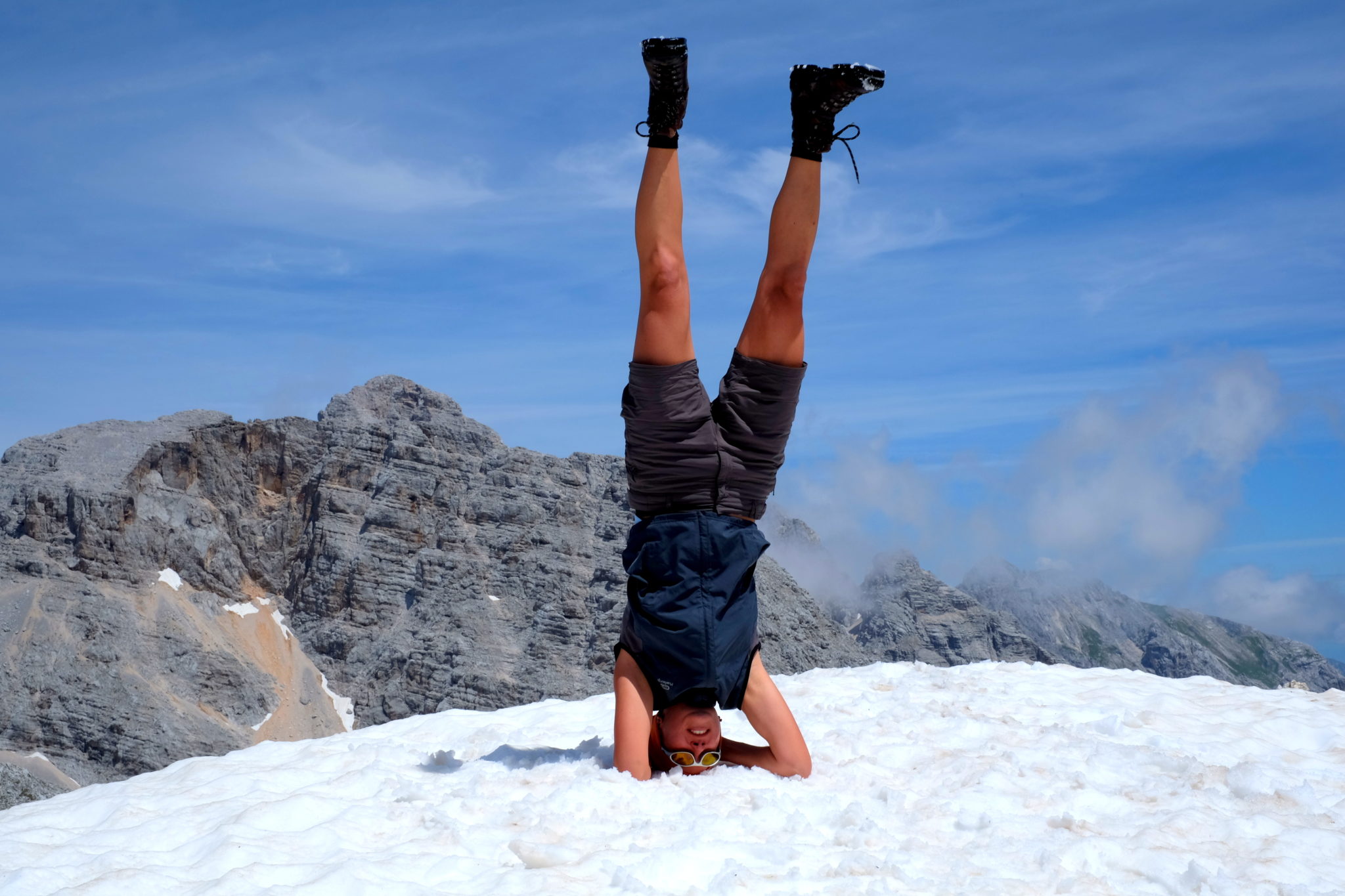 Doing a headstand on Mt. Križ.