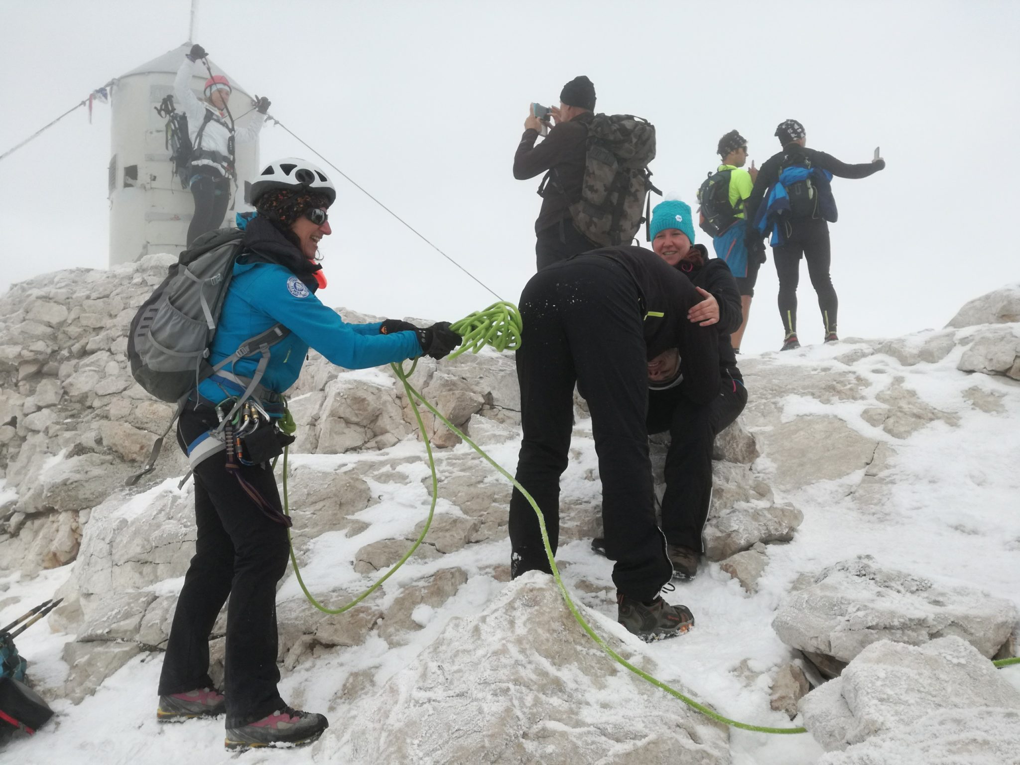 Just a normal scene at the top of Triglav. Someone posing at the Aljaž tower, two taking a selfie, women hitting men on their behinds, nothing unusual on that side.