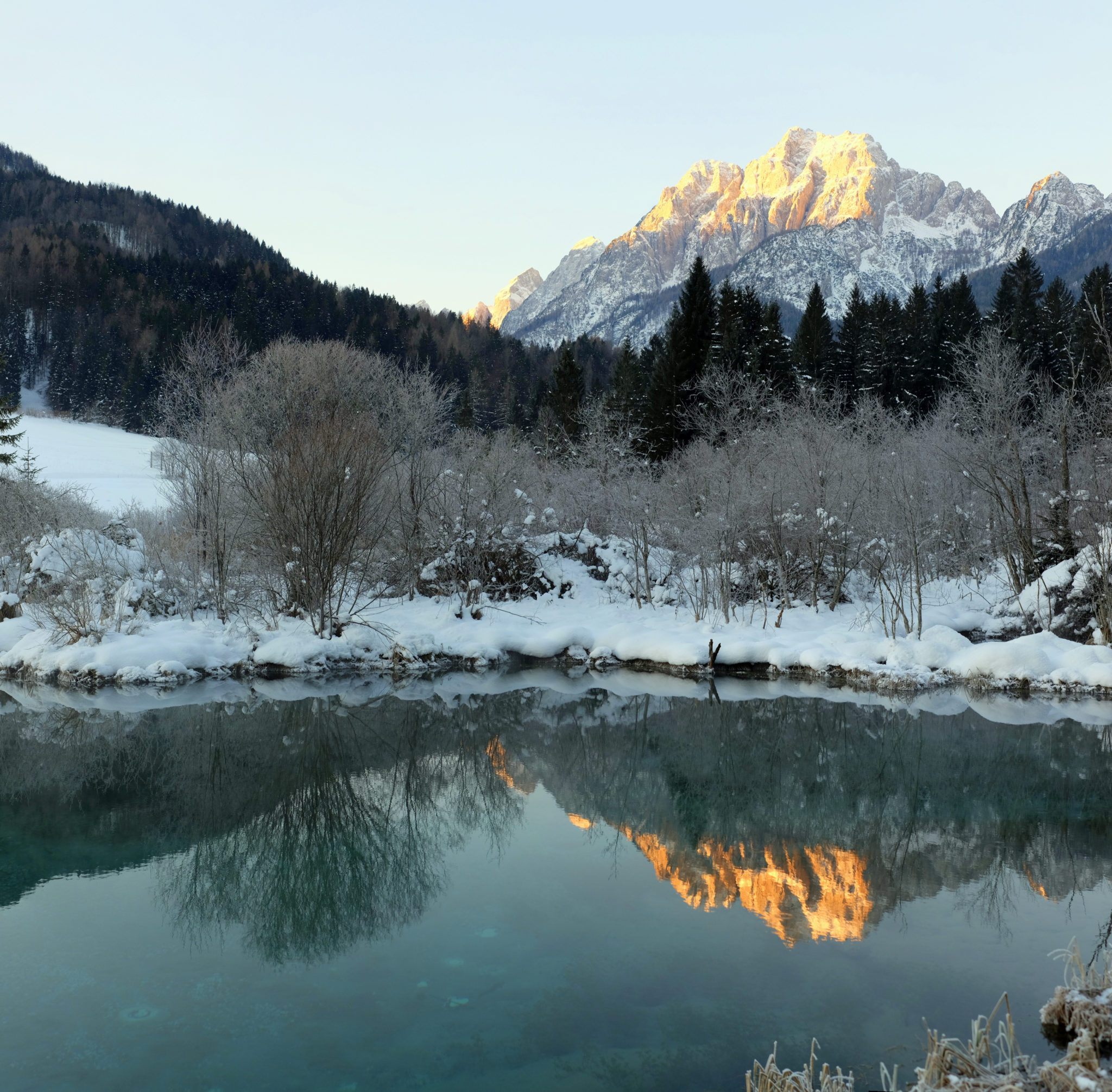 Mountains at the sunrise as seen from the Zelenci Springs