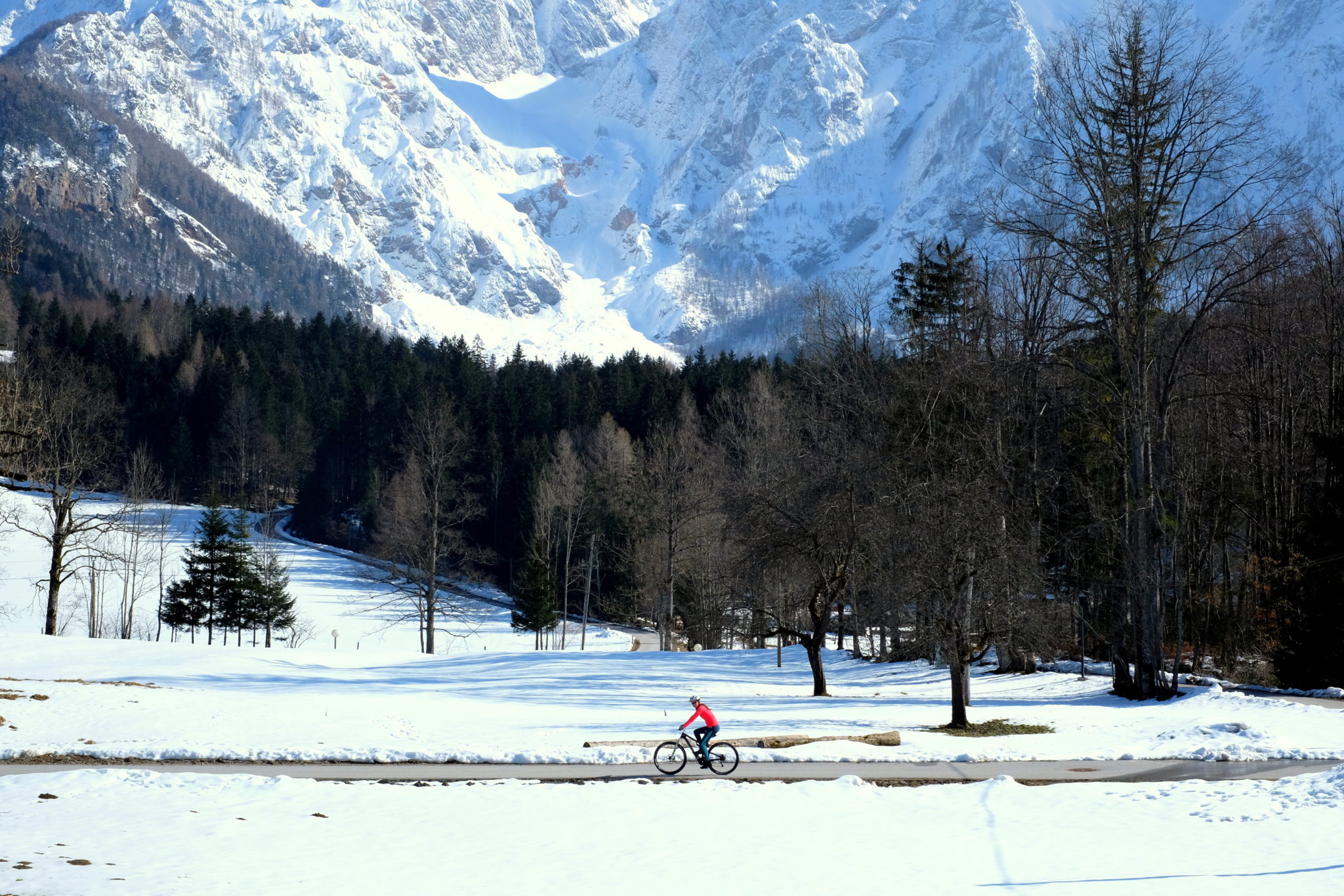 Cycling under high mountains; Jezersko, Slovenia