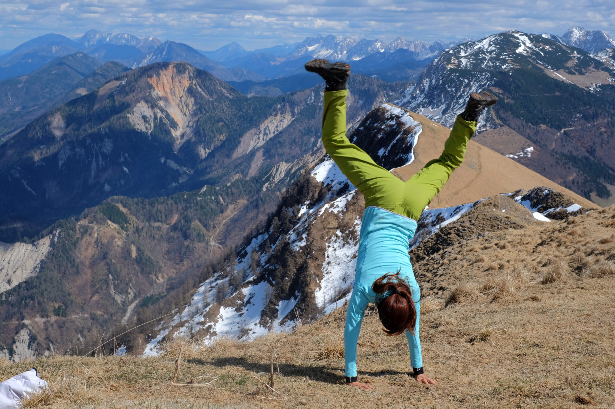 A happy mountaineer at the top of Golica, Slovenia.