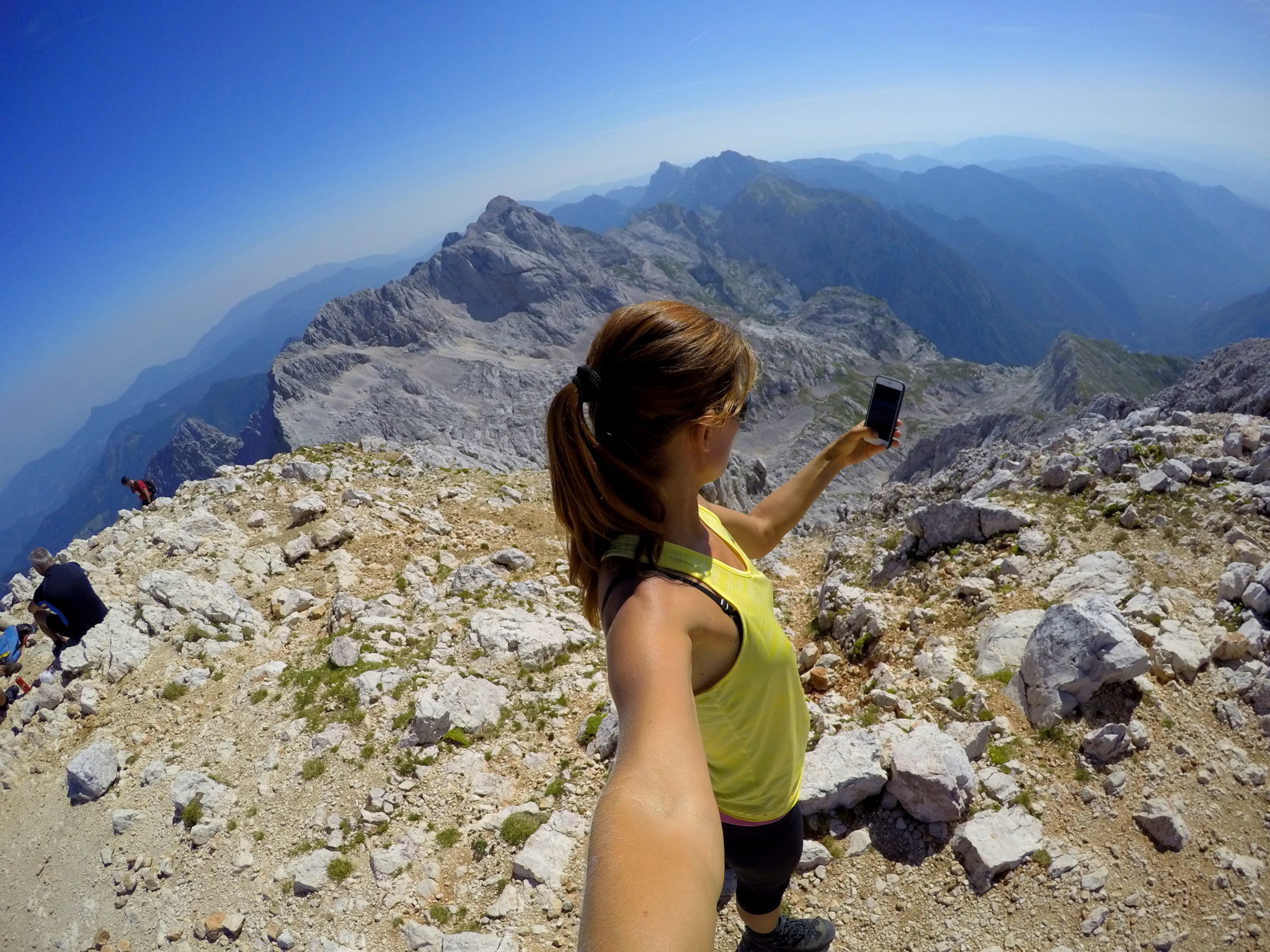 At the top of Grintovec, overlooking Dolgi Hrbet, Skuta and Brana