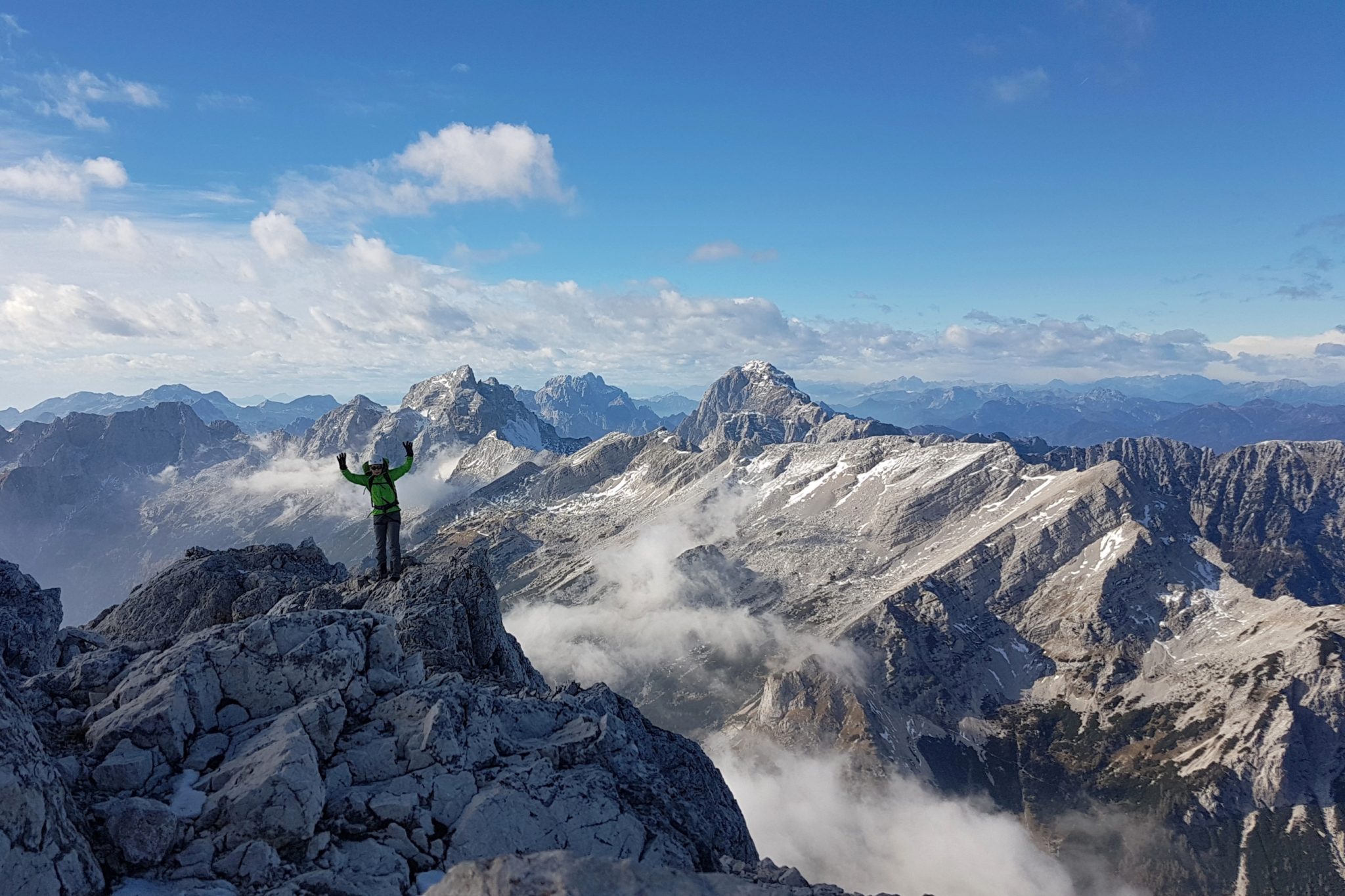 A female hiker on the top of Prisojnik, Julian Alps, Slovenia