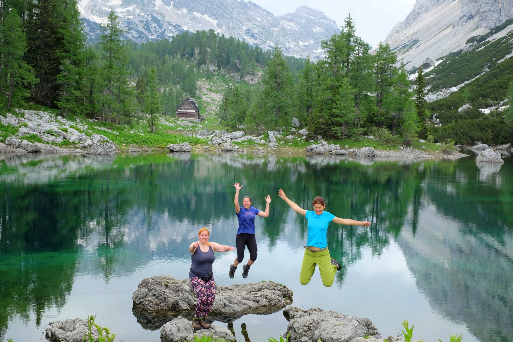 Three women by the Double Lake of the Triglav Lakes, Slovenia, Triglav National Park