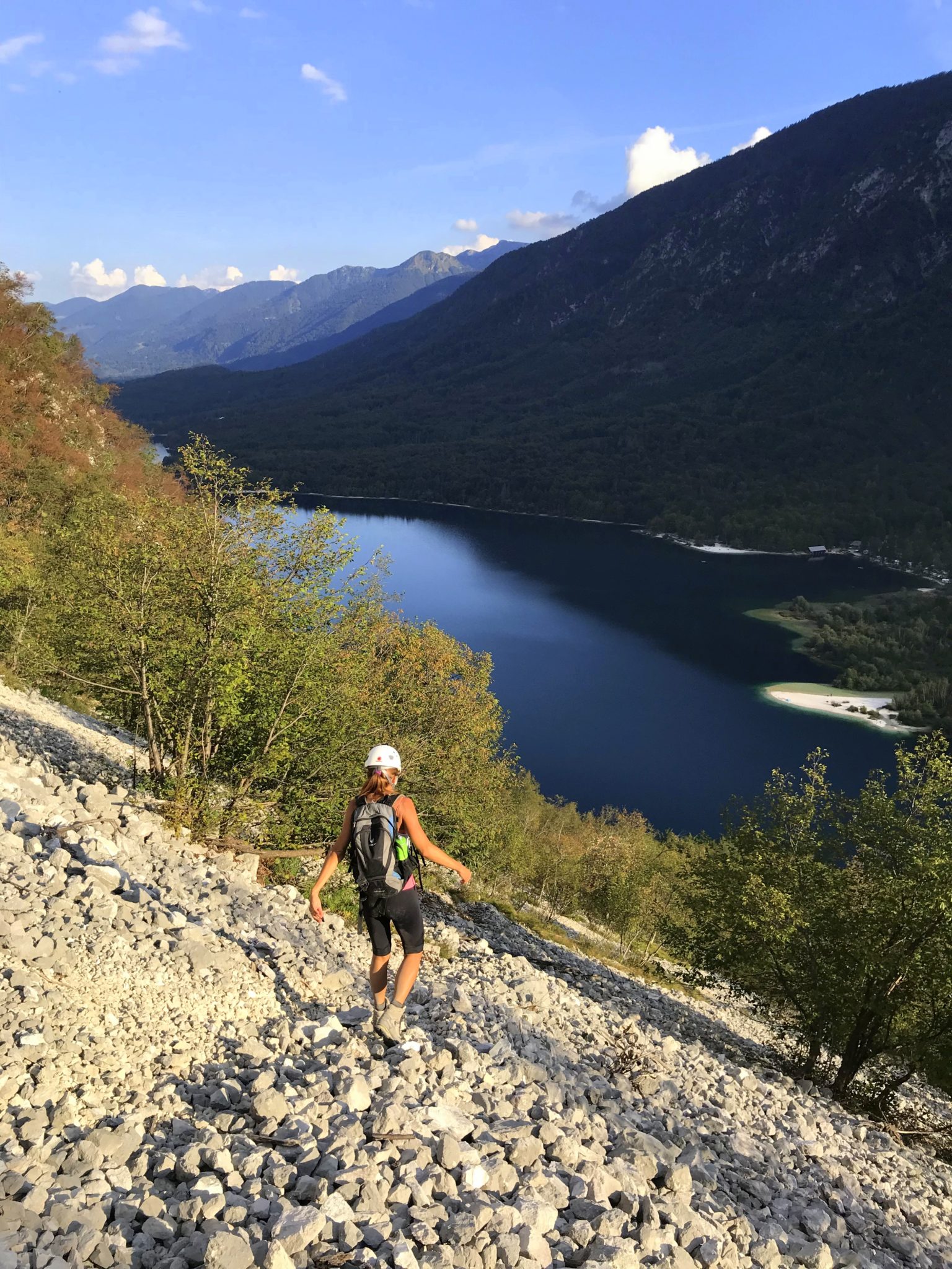 Hiking down the via ferrata Ožarjeni Kamen above Lake Bohinj, Slovenia