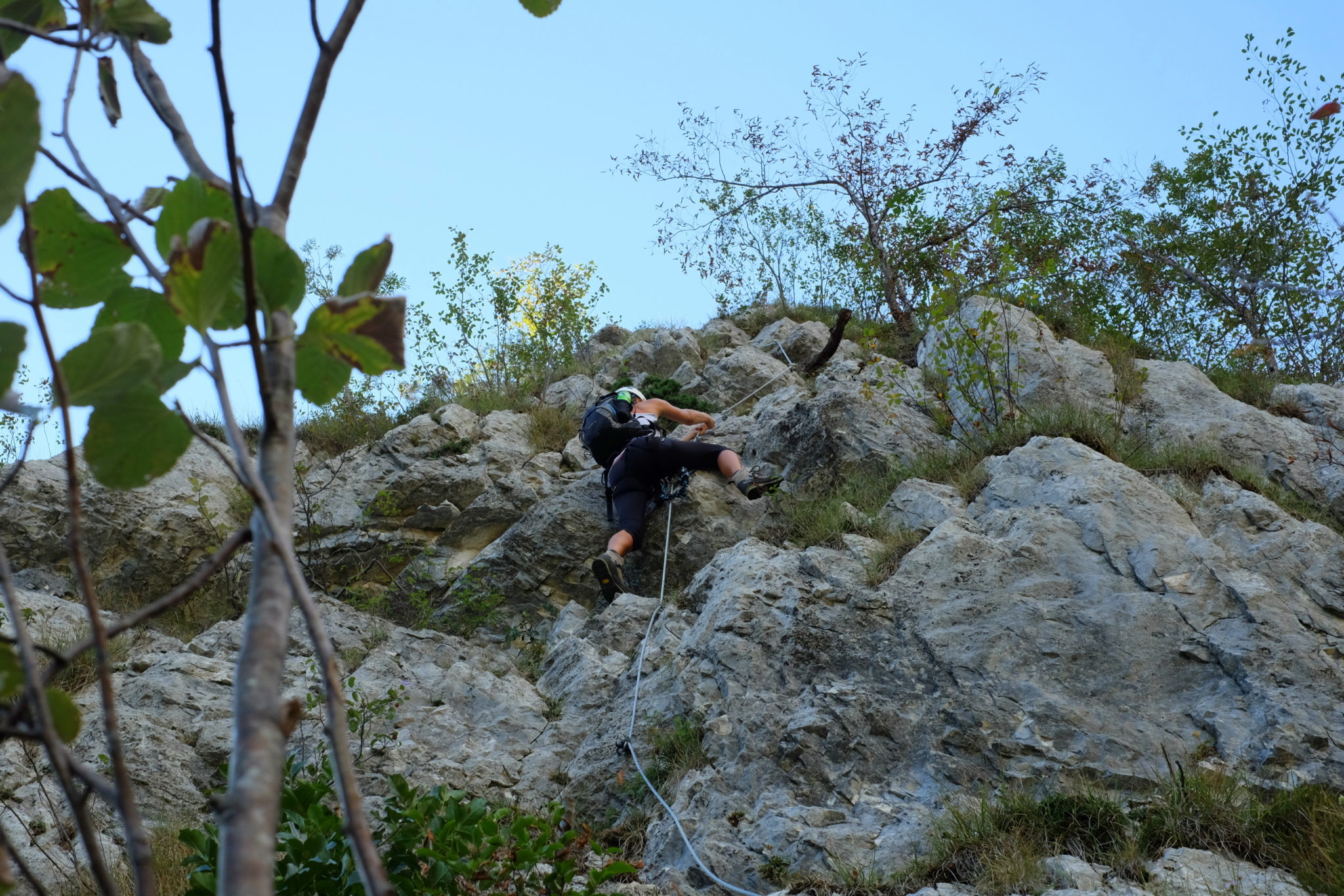 Climbing the via ferrata above Lake Bohinj, Ožarjeni Kamen, Triglav National Park, Slovenia