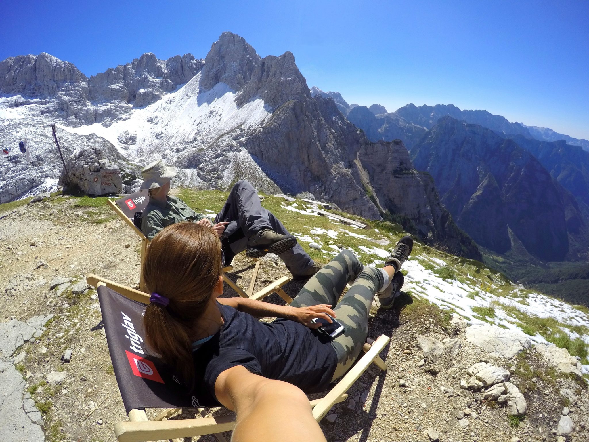 Enjoying easy time in the mountains, at the Pogačnik Hut, Julian Alps, Slovenia