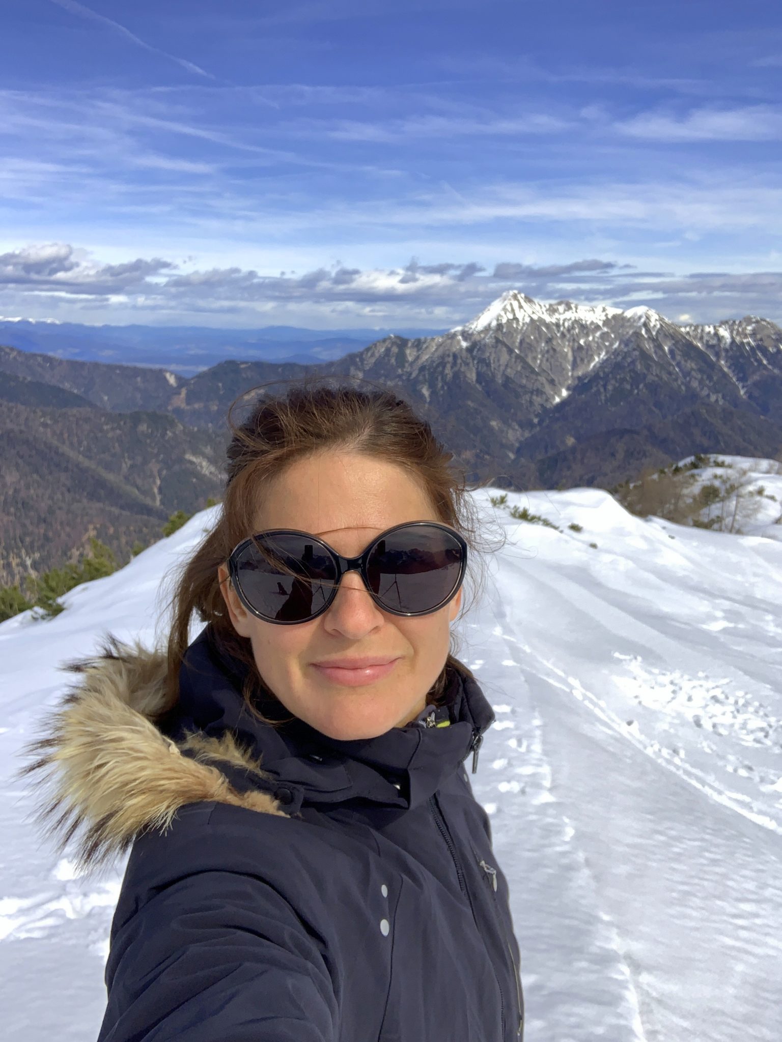 Cheers from the top of Vrtaški Vrh, Julian Alps, Slovenia